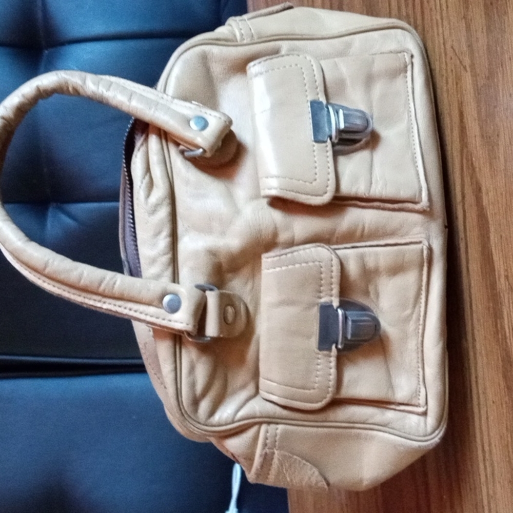 Romanian Butterscotch Leather purse. Size Is 9 By 5 By 4. Handles Are 4 In. Tall